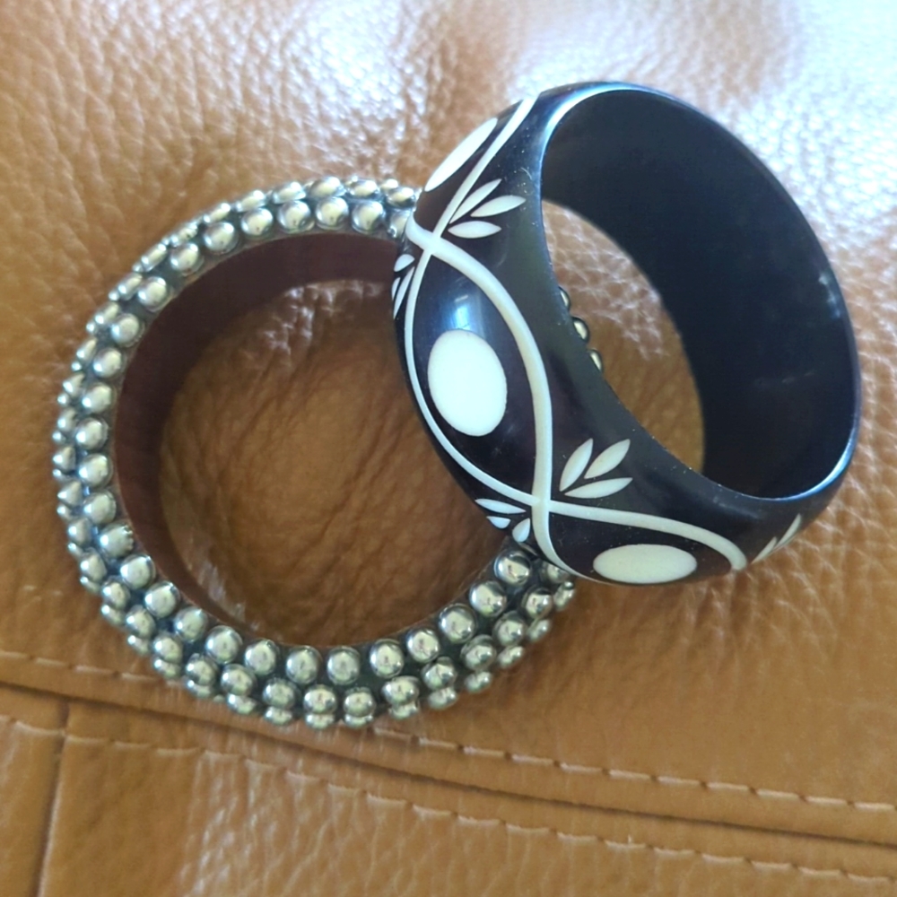 Bangle bracelet duo, one wooden w/metal studs and one carved resin, like new!